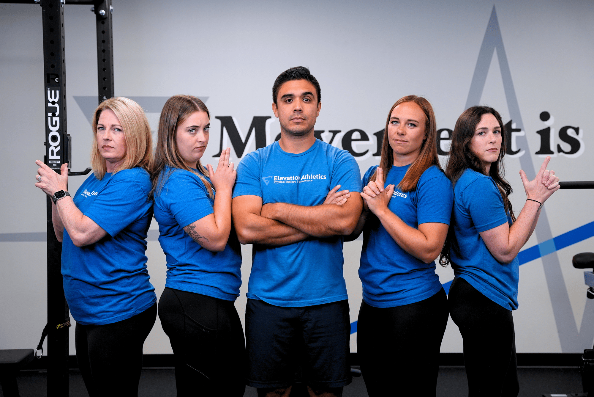 Orthopedic physical therapist performing dry needling treatment on athlete's shoulder in Fort Worth clinic Orthopedic physical therapist performing dry needling treatment on athlete's shoulder in Fort Worth clinic